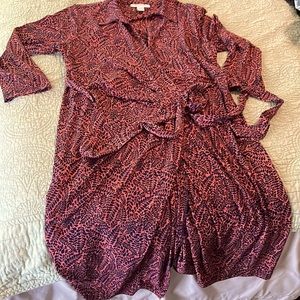 Leaf patterned pink and blue maternity wrap dress.